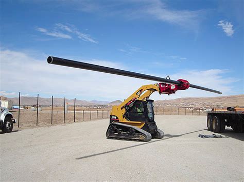 setting 646 poles with skid steer|skid steer claw attachment.